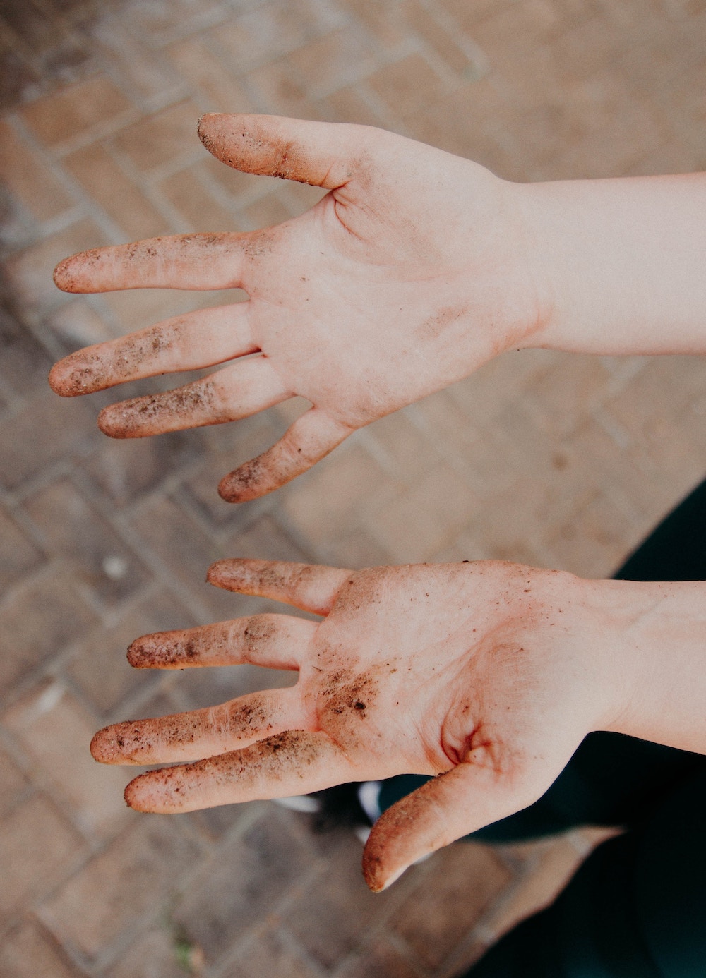 hands dirty from gardening