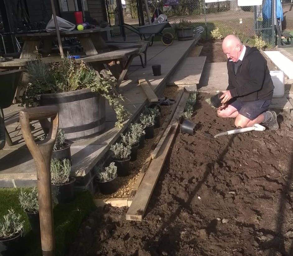 Woodbridge Tennis Club chairman Steve Lemon planting up the new garden