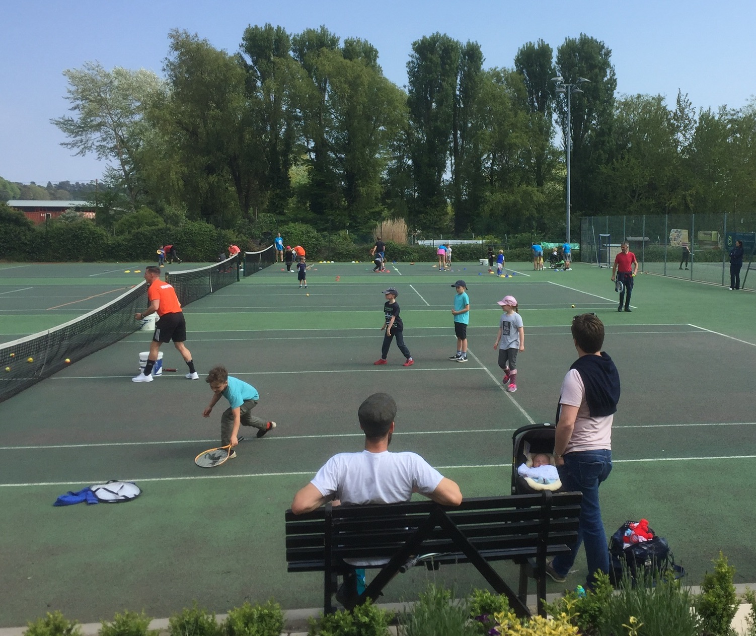 Watching the tennis players at Woodbridge Tennis Club in Suffolk