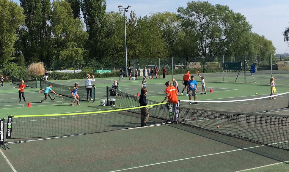Players on court at the Big Tennis Weekend at Woodbridge Tennis Club in Suffolk