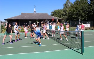 Members of Woodbridge Tennis Club on court